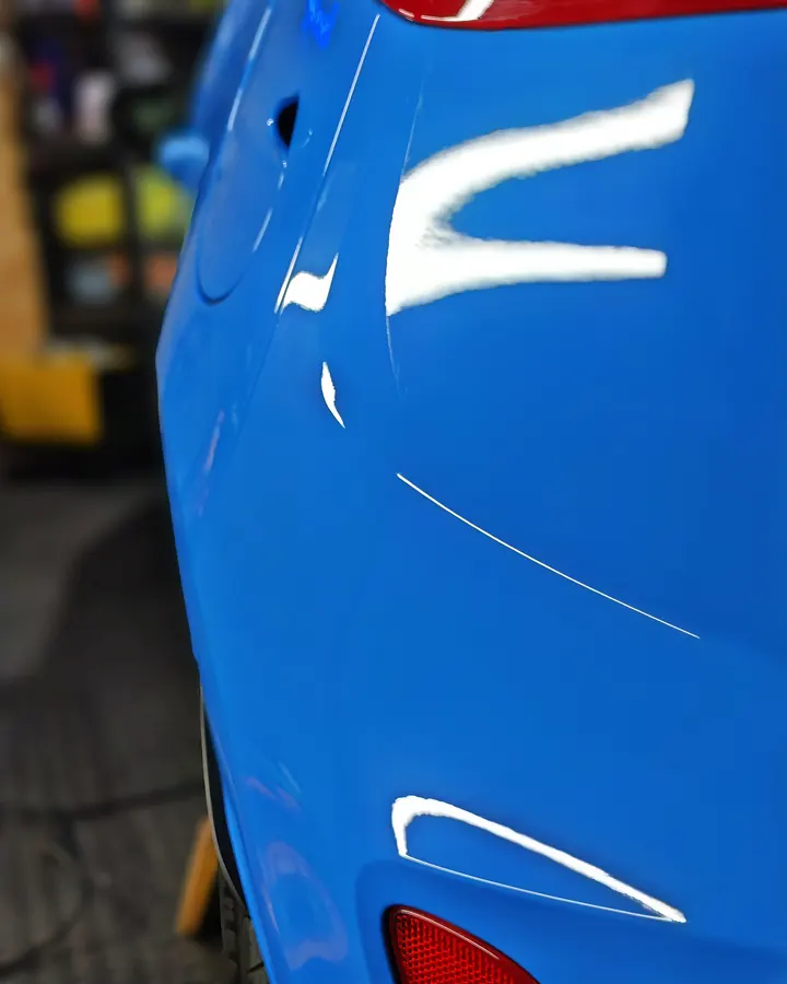 Close-up of glossy blue paintwork